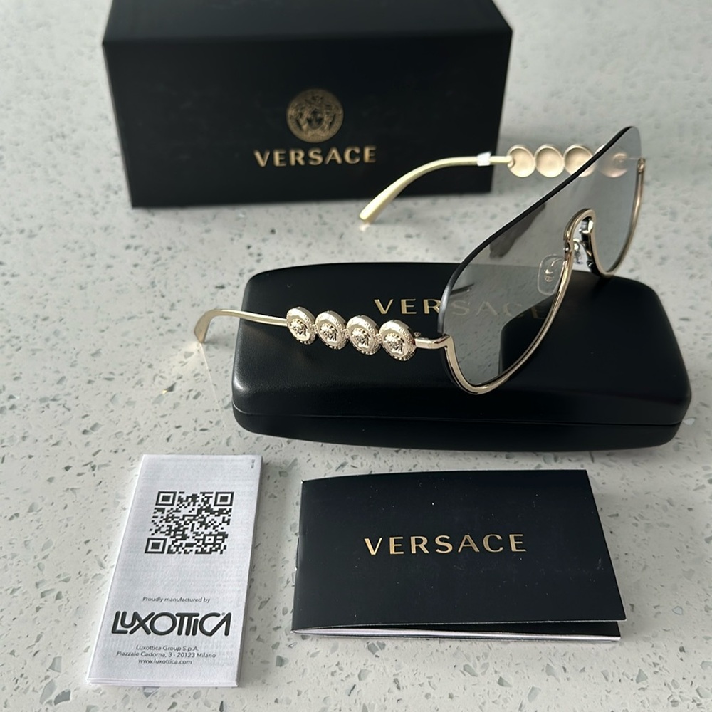 Versace Women's Sunglasses with Gold and Black Accents
